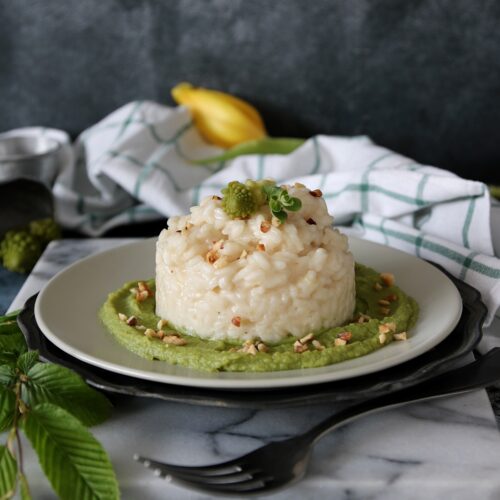 risotto al caprino nocciole e maggiorana con broccolo romanesco